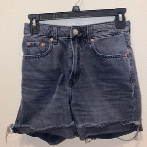 Black high rise jean shorts.